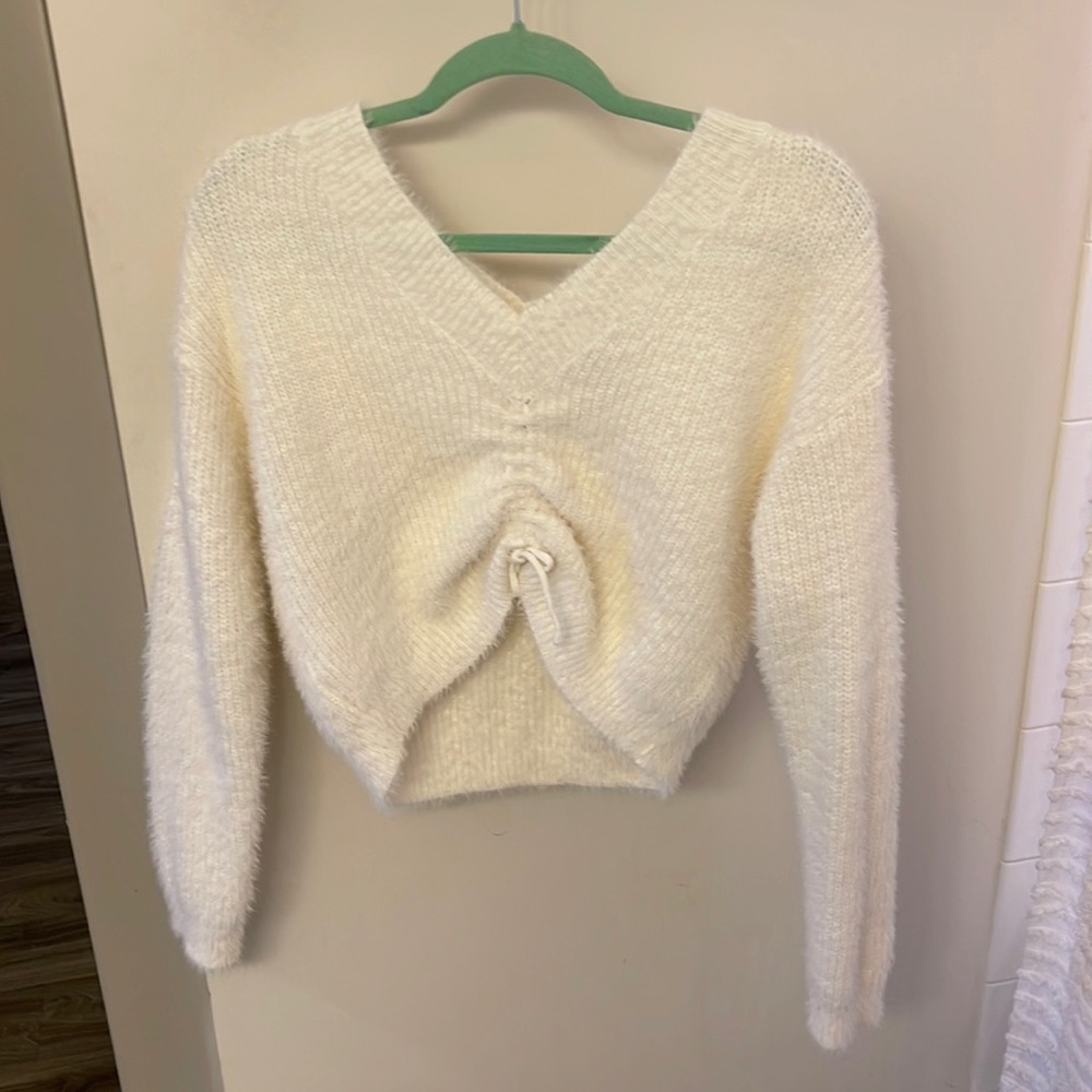 White fuzzy cinched crop sweater